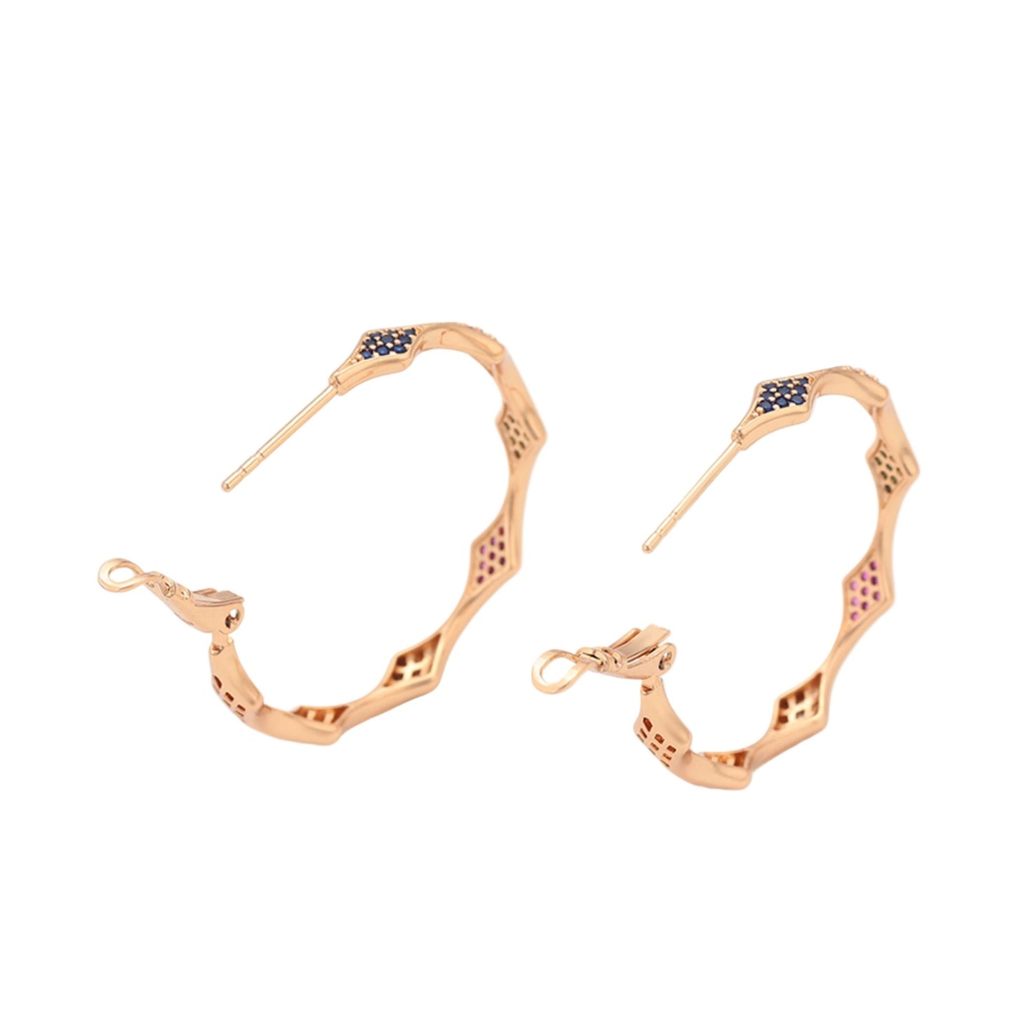 Rose gold hoop earrings with blue, red and green gemstones on a white background
