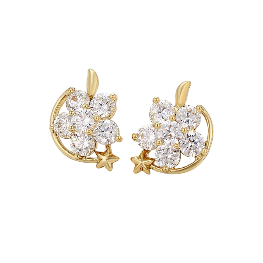 Gold earrings with star and flower designs on a light background