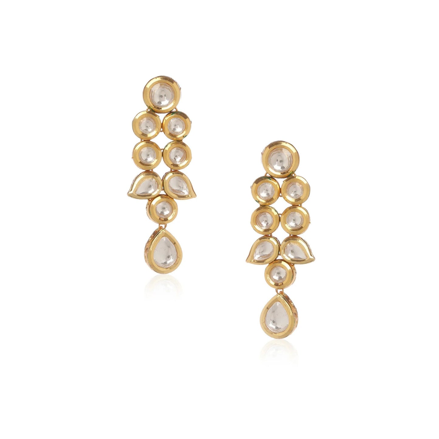 Gold earrings with clear stones on a white background