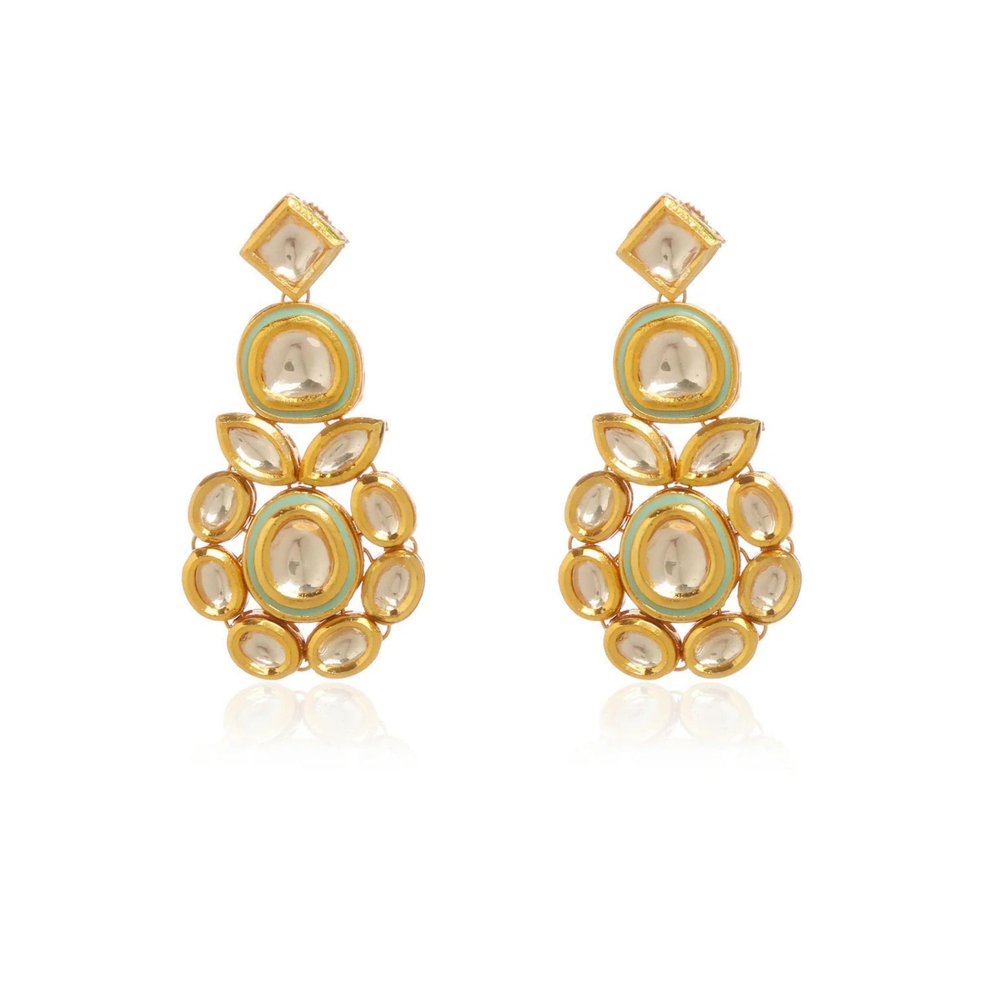 Gold earrings set with clear gemstones and a mint hue finish on a white background