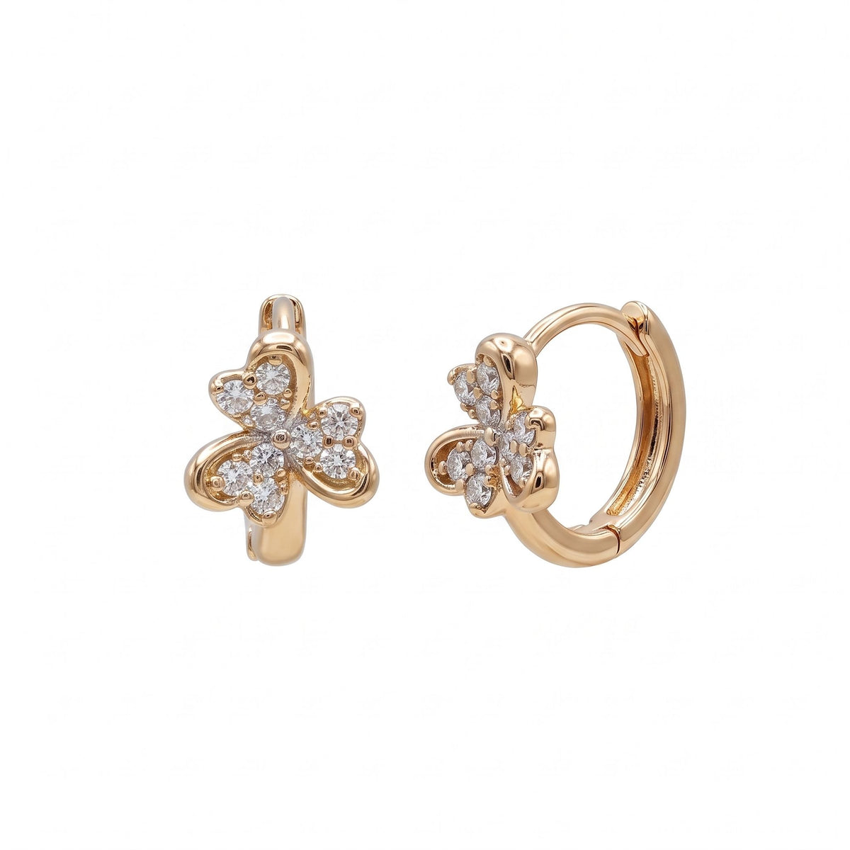 A pair of gold huggie hoop earrings featuring three small heart shapes with clear round-cut gemstones from the Jewellery 4 Elegance collection, set against a plain white background.