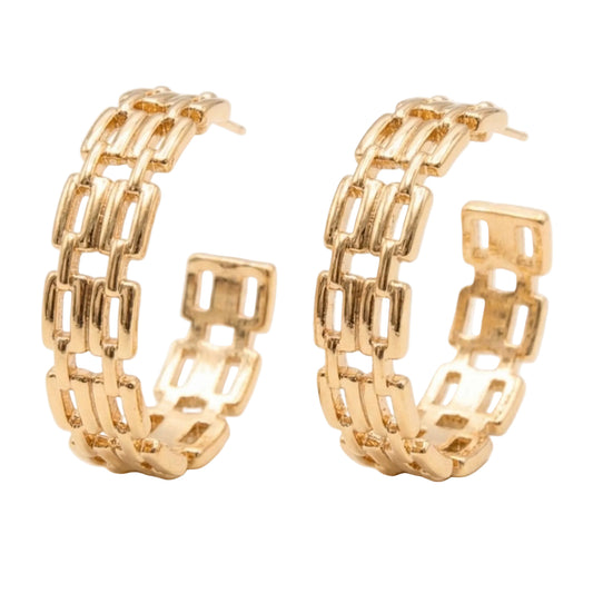 Gold chain hoop earrings on a white background