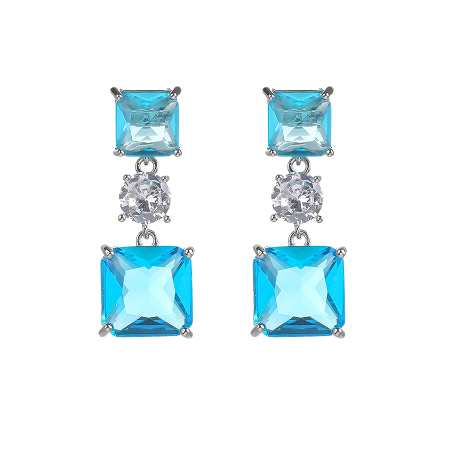 Pair of earrings with two blue square zirconia stones earrings connected by a central clear stones on a white background