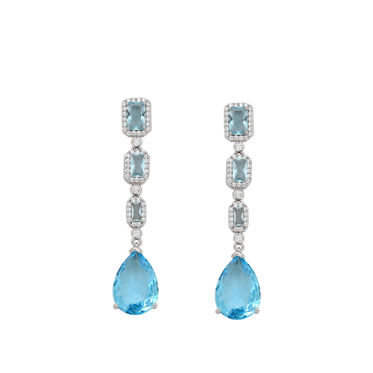 Pair of blue aquamarine drop earrings on a white background