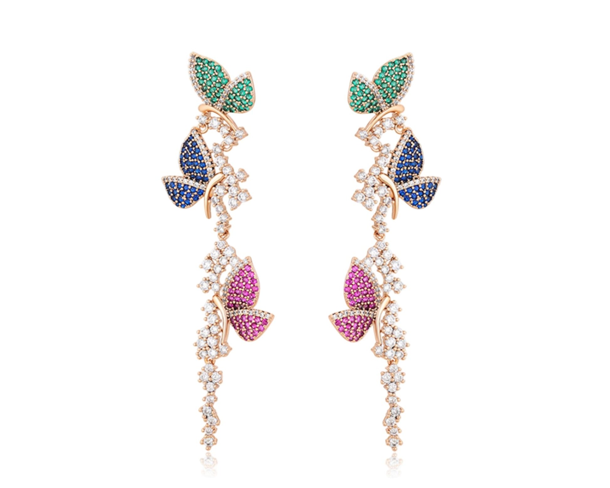 Pair of butterfly-shaped earrings with gemstones on a white background