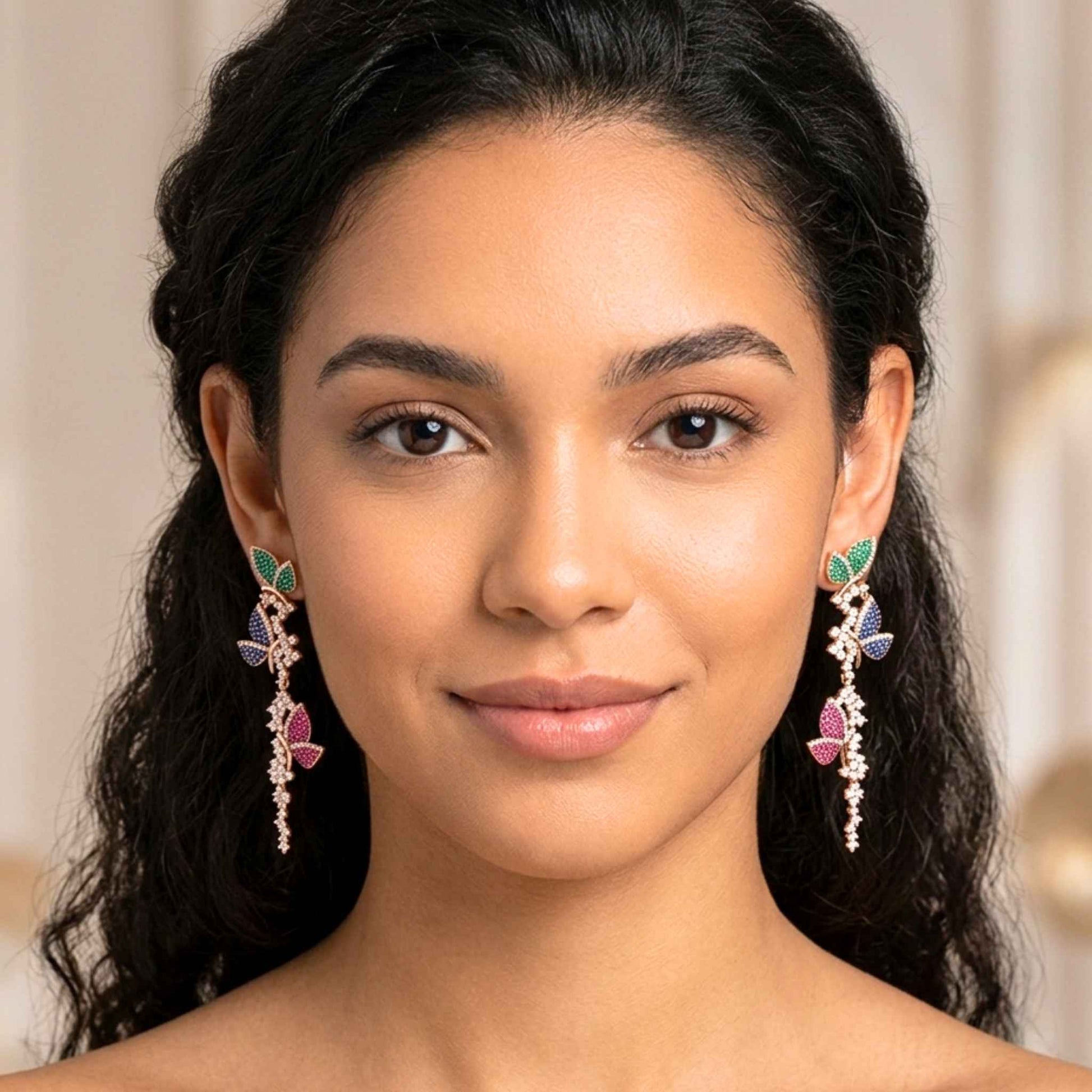 Woman wearing colourful butterfly earrings with a neutral background.  Digitally rendered model for scale.