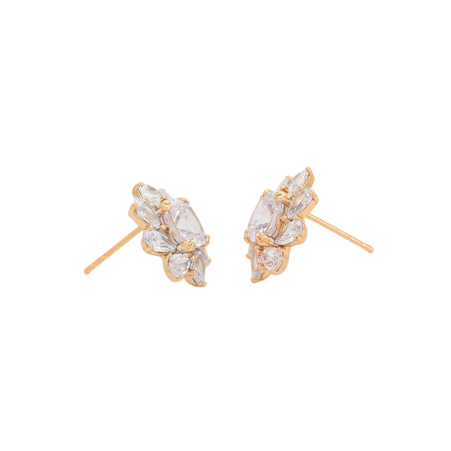 Gold earrings with clear zirconia stones on a white background