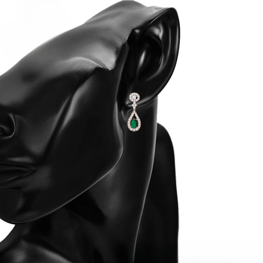 Earring with green emerald zirconia on a model
