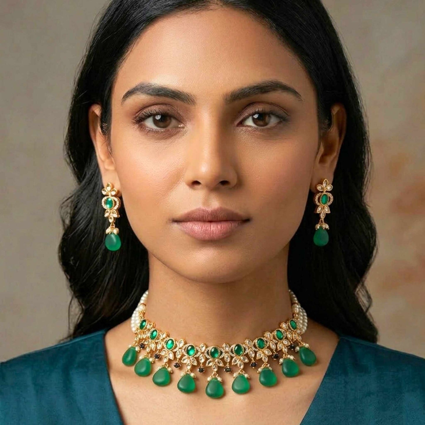 Woman wearing green and gold jewellery against a neutral background.  Digitally rendered model for scale
