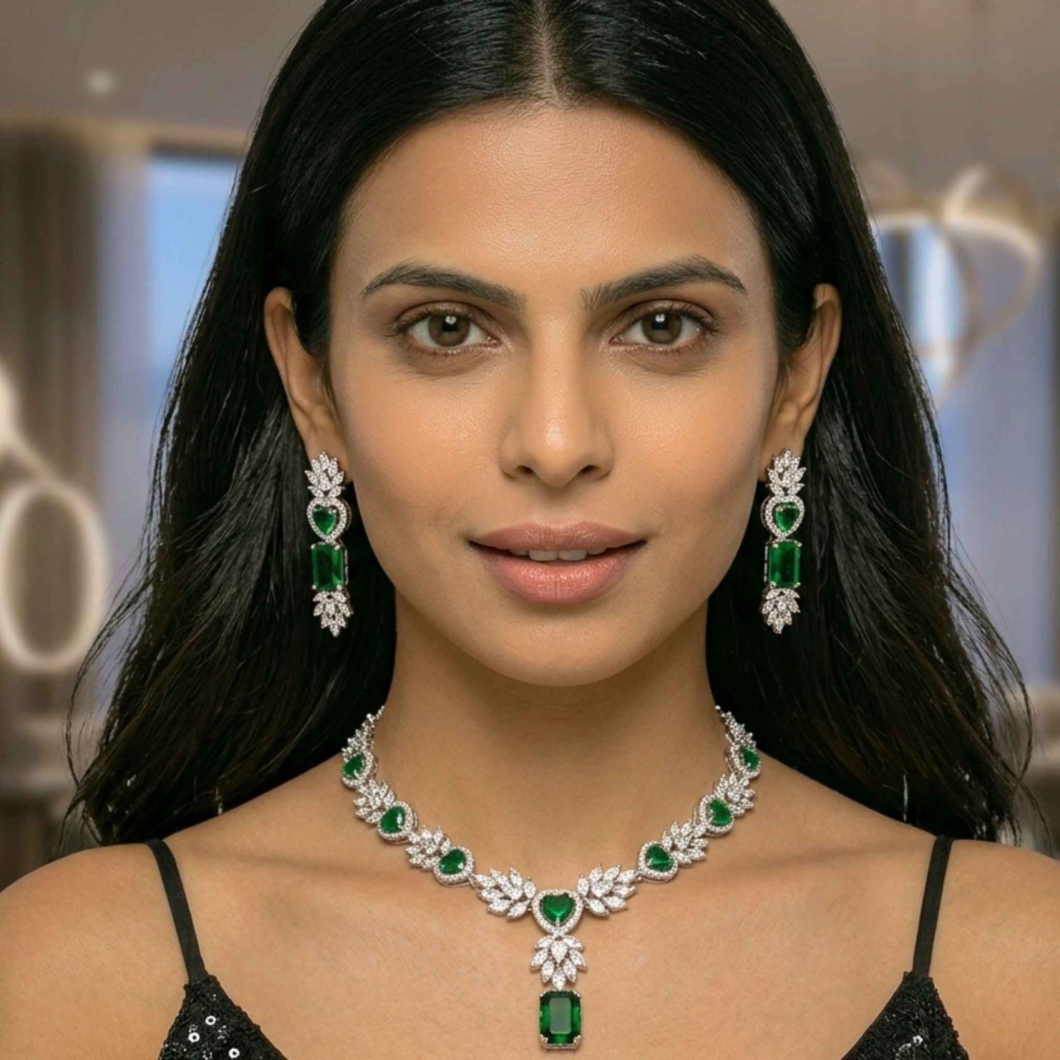 Woman wearing a green and silver jewellery set with a blurred background.  Digitally rendered model for scale.