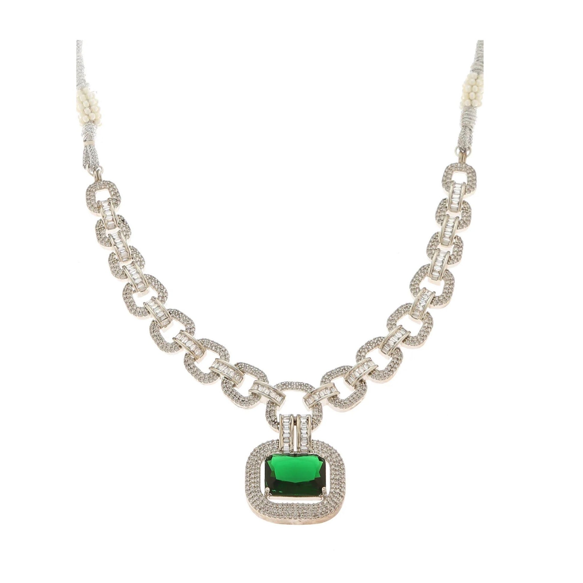 Silver necklace necklace with a green gemstone pendant on a white background