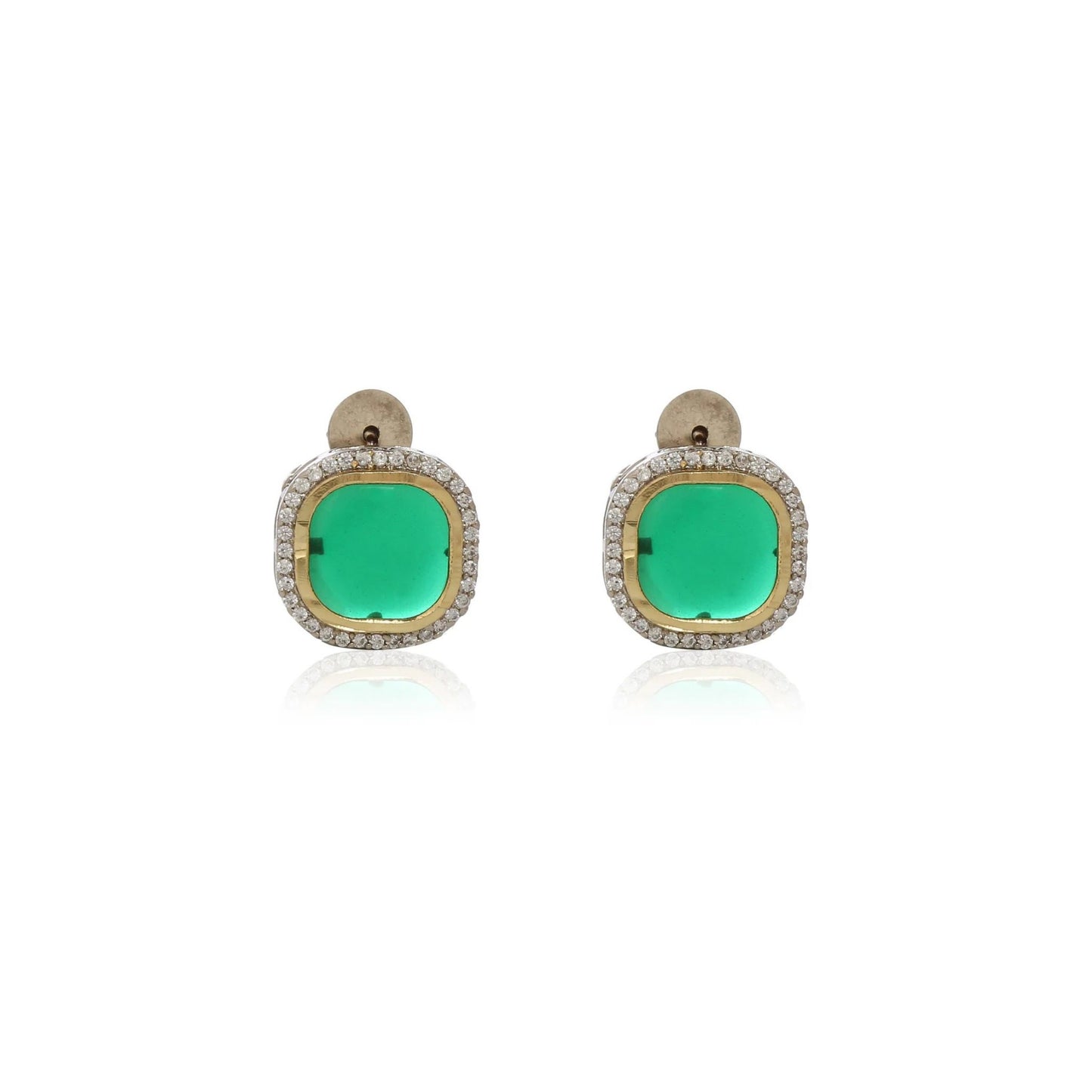 Pair of earrings with green gemstones and gold accents on a white background