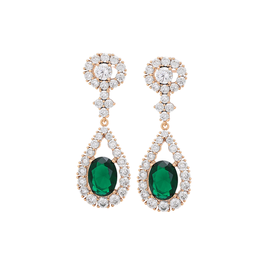 Pair of earrings with emerald green stones and rose gold accents on a white background