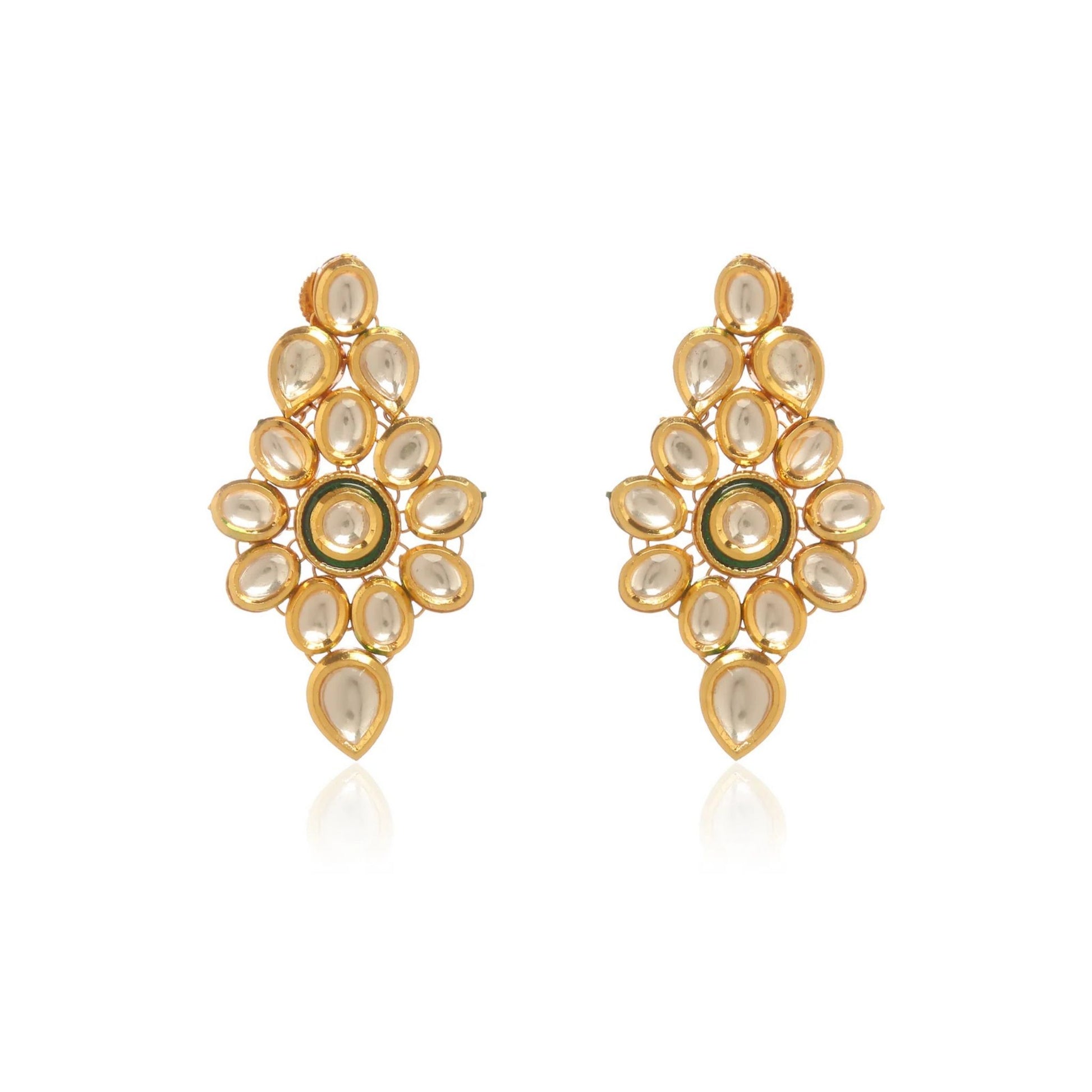 Gold earrings with green center on a white background
