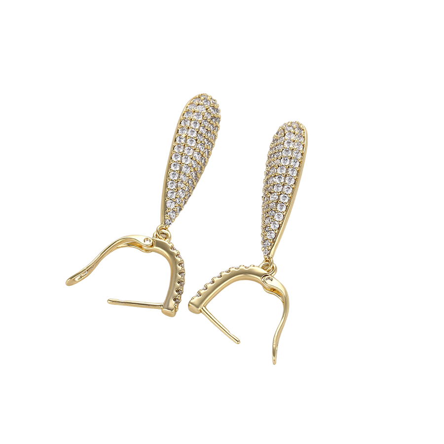Gold dangler earrings with sparkling zirconia stones on a white background