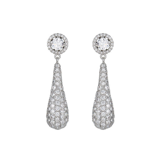 Pair of white gold diamond teardrop earrings on a white background