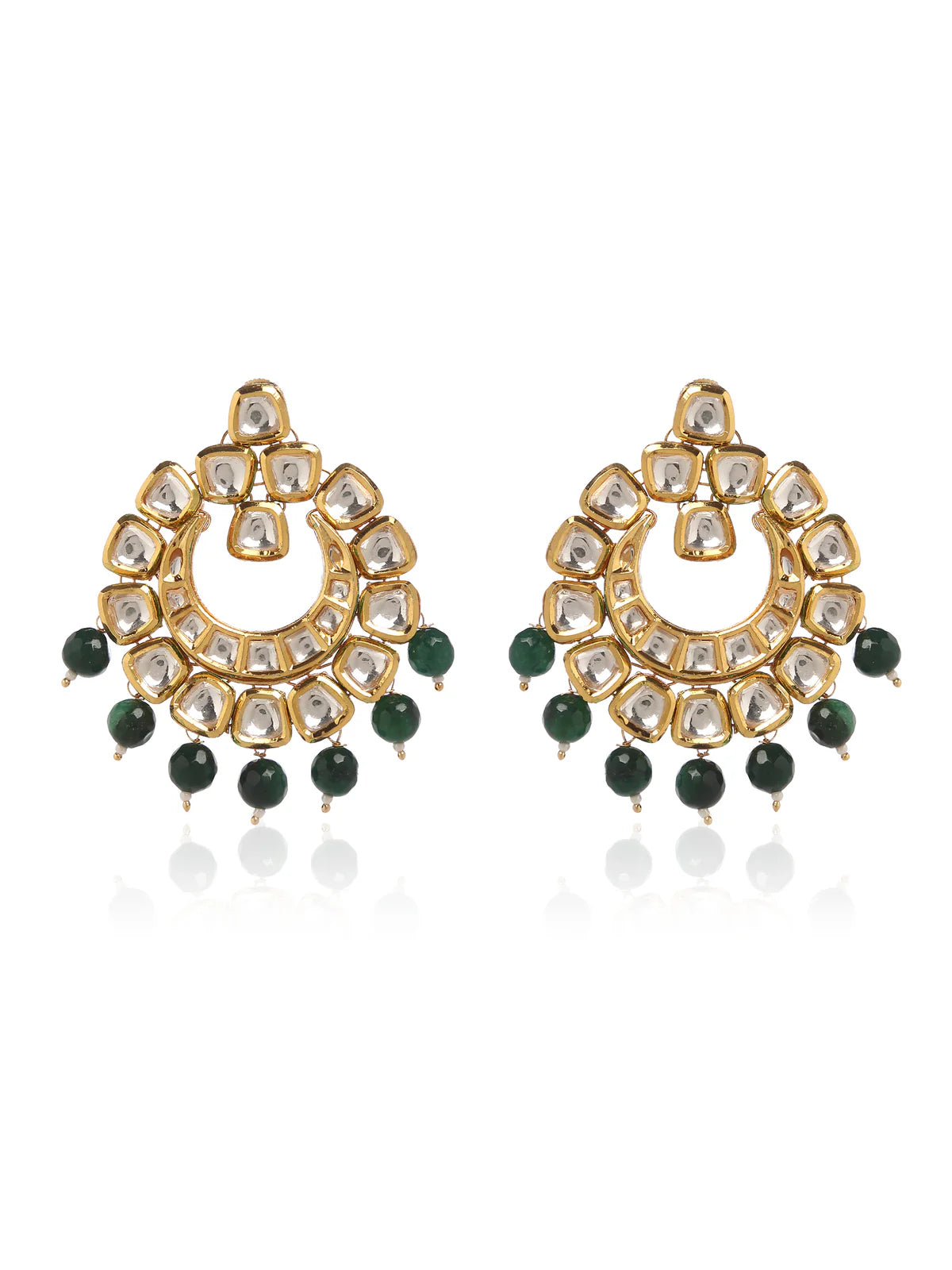 A pair of Kundan earrings in 22k gold plating set against a white background.