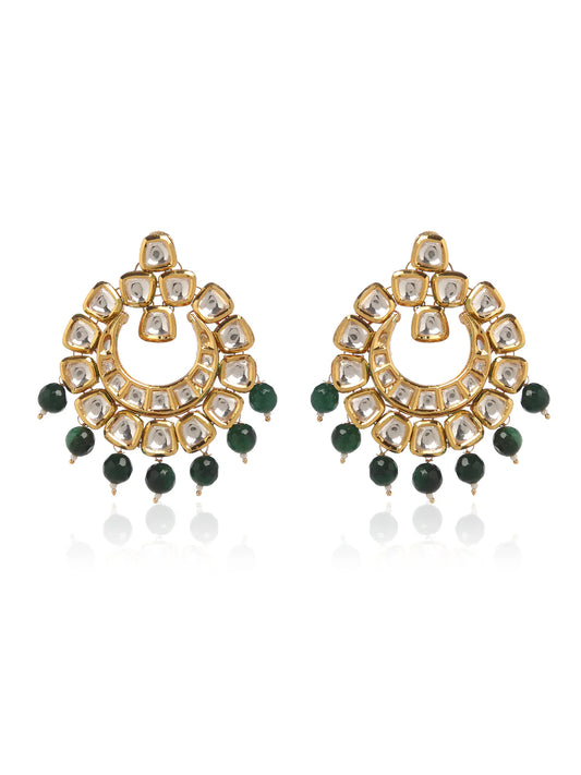 A pair of Kundan earrings in 22k gold plating.