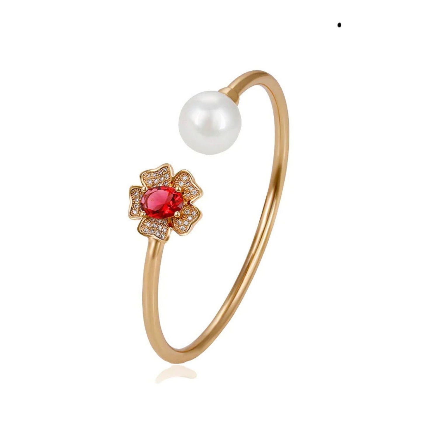 An 18k gold plated bracelet featuring a pearl and a rose coloured zirconia stone, with a floral design against a white background.