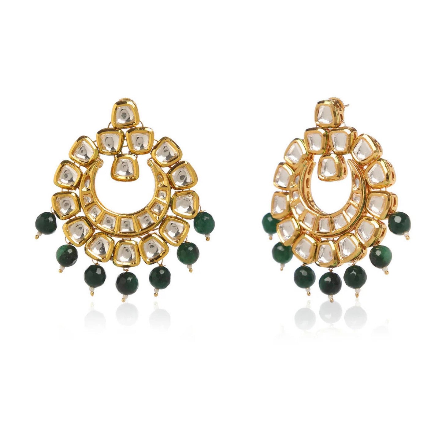Pear of gold earrings with green bead drops and clear zirconia stones against a white background