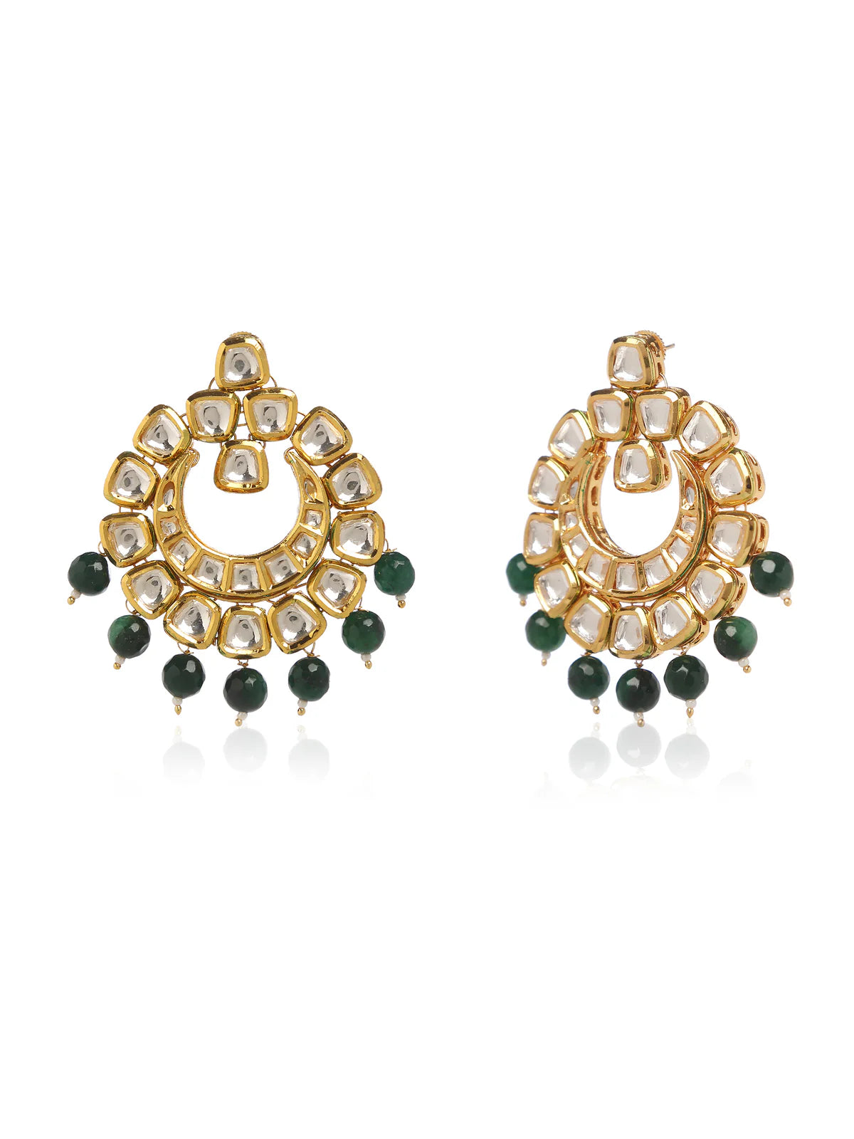 Pear of gold earrings with green bead drops and clear zirconia stones against a white background