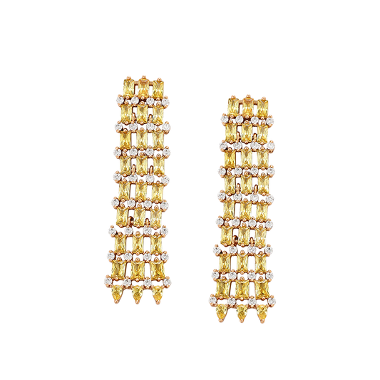 Gold earrings with sparkling gem stones on a white background
