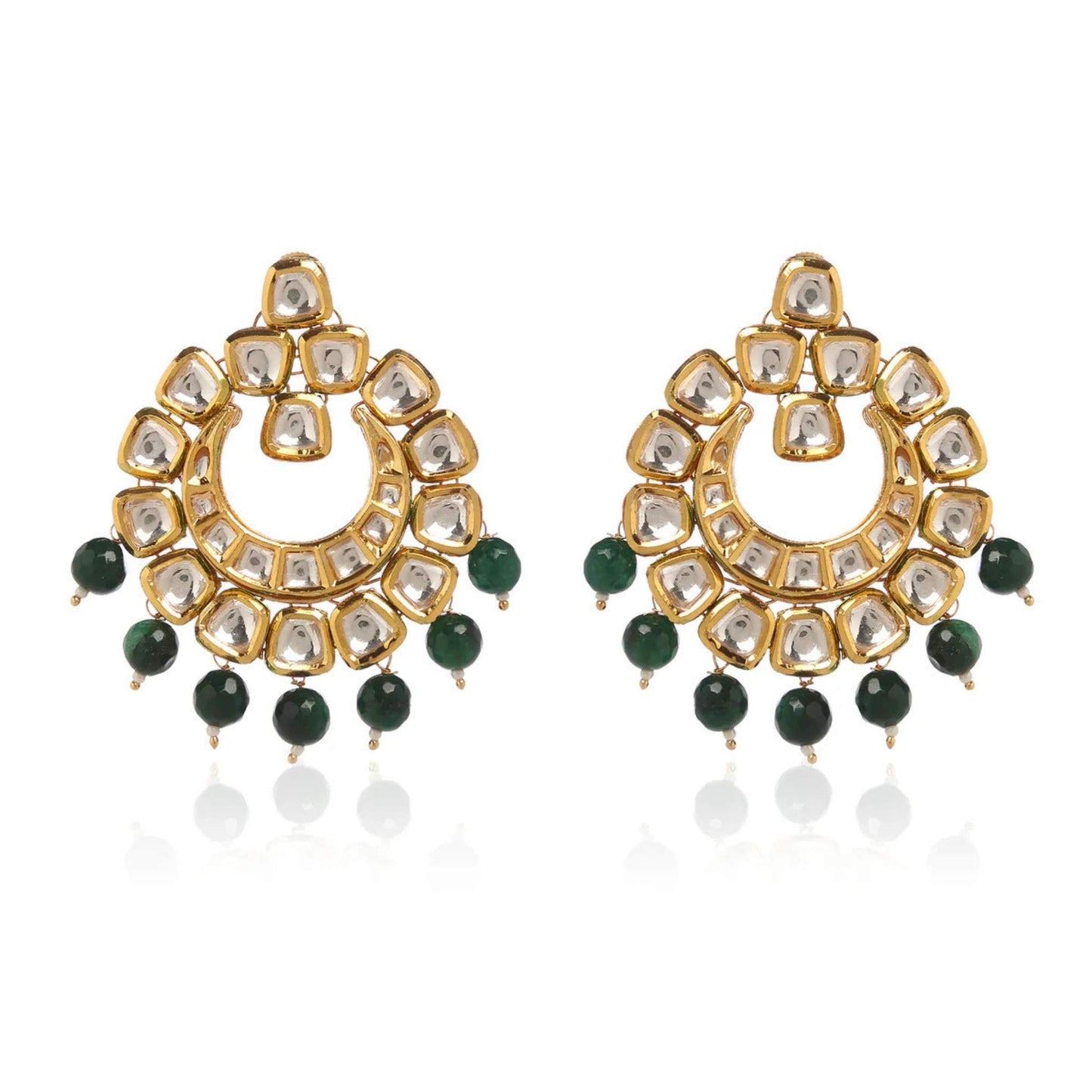 A pair of Kundan earrings in 22k gold plating set against a white background.