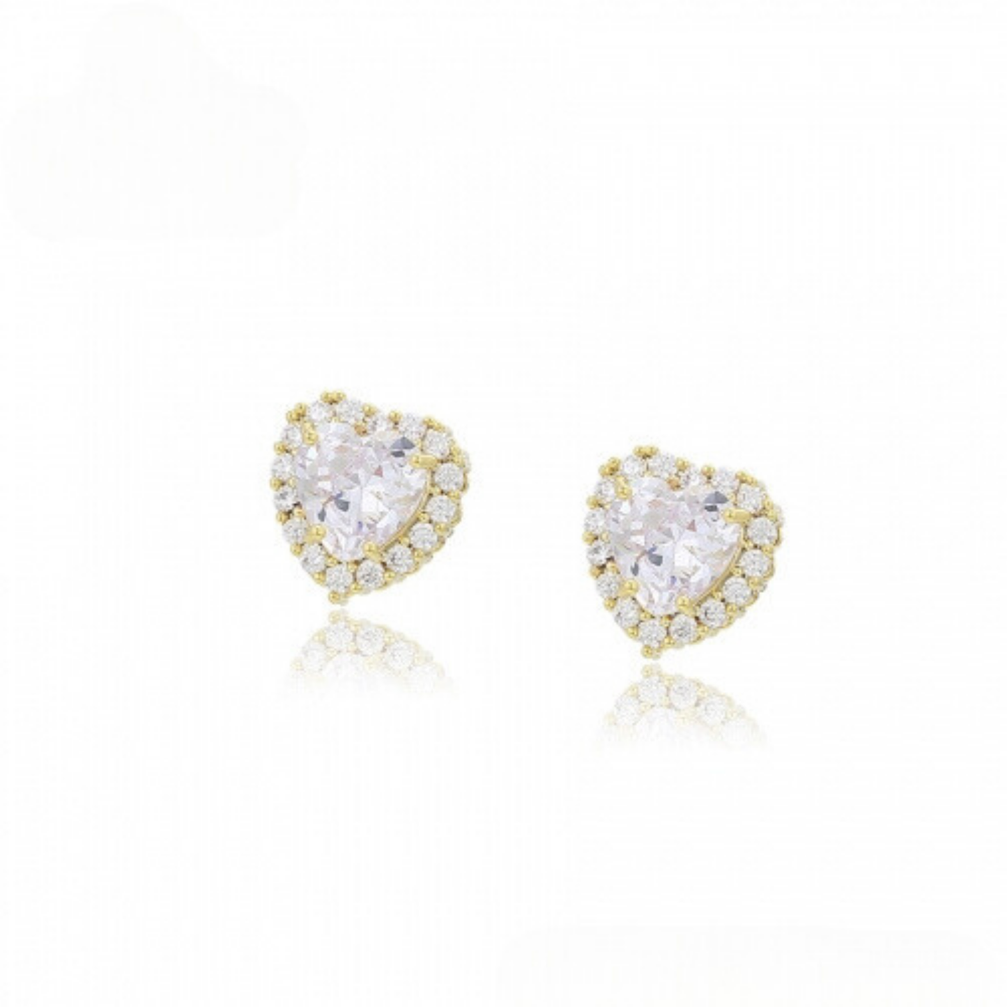 Heart-shaped gold earrings with clear zirconia stones on a white background