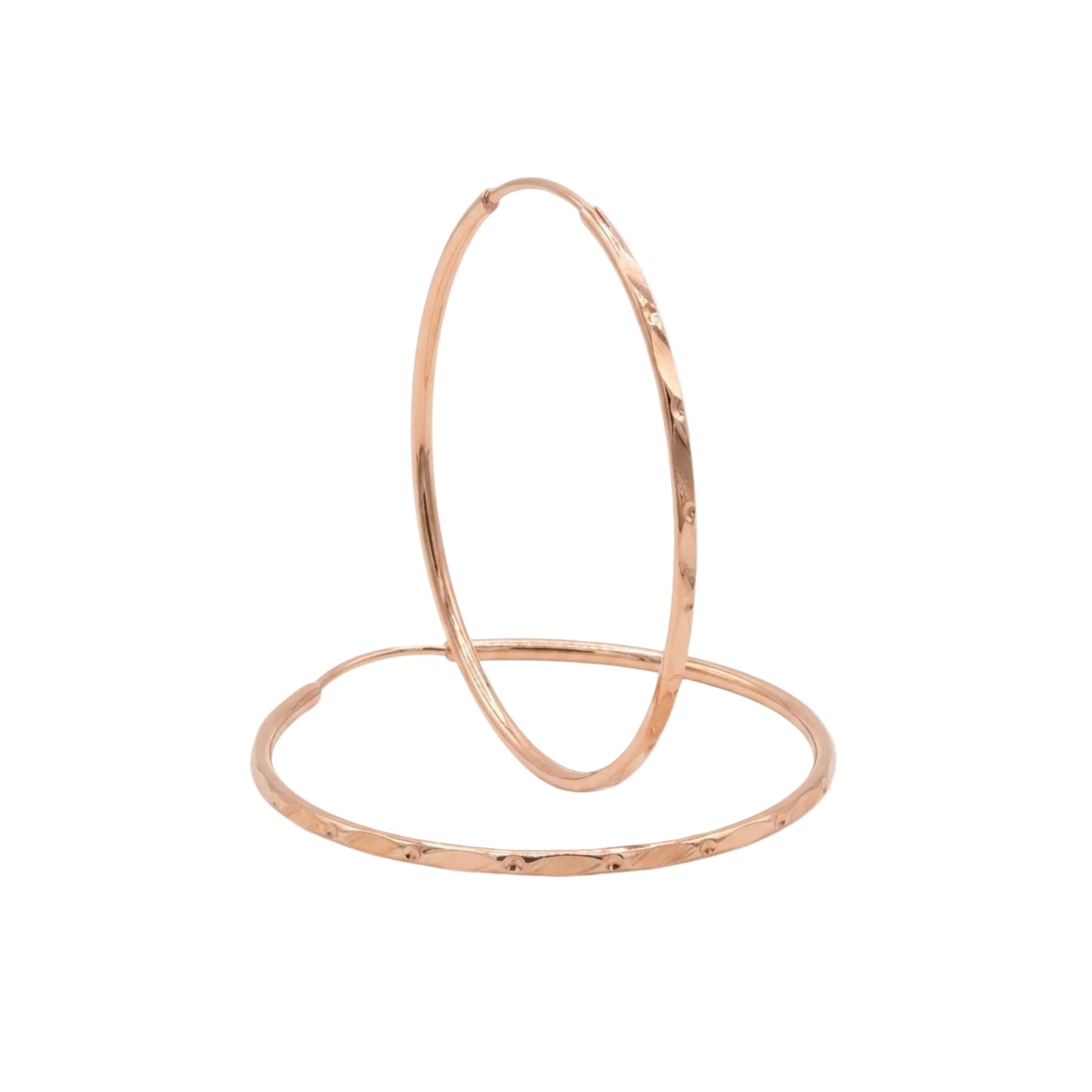 Rose gold hoop earrings on a white background