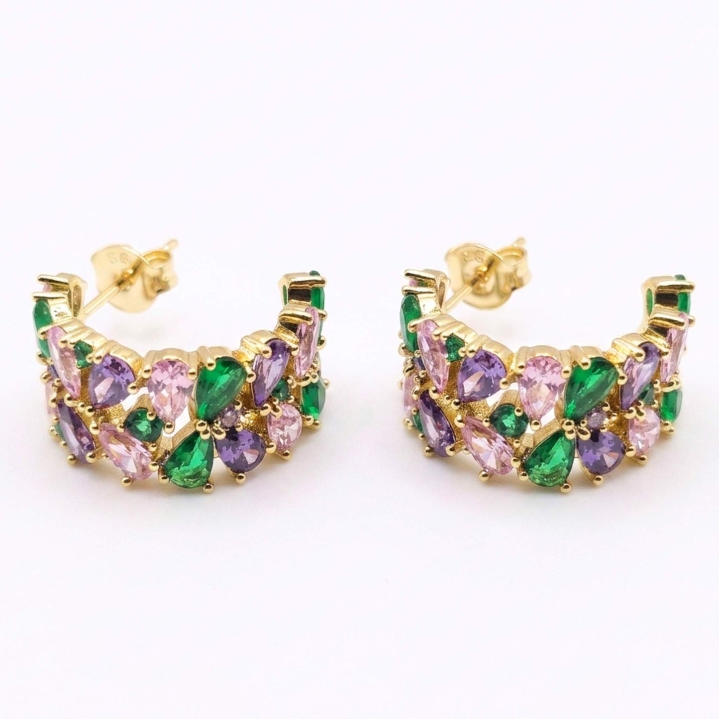 Pair of quality gold plated hoop-style stud earrings adorned with an elegant mosaic of green, purple, pink, and clear cubic zirconia gemstones on a crisp white background.