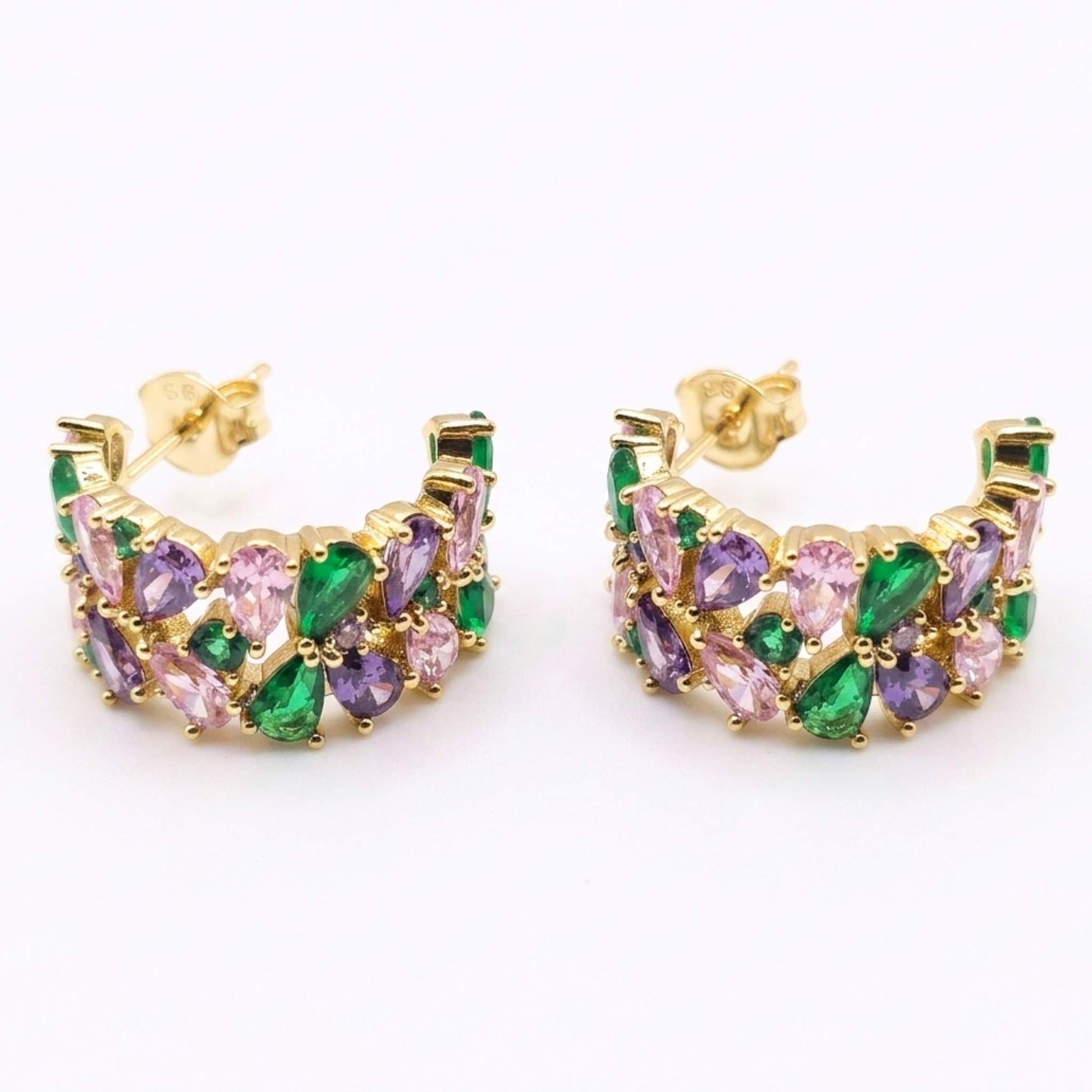 Pair of quality gold plated hoop-style stud earrings adorned with an elegant mosaic of green, purple, pink, and clear cubic zirconia gemstones on a crisp white background.