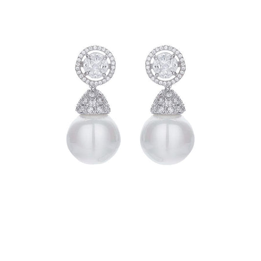 Pair of pearl earrings with diamond-like stones on a white background