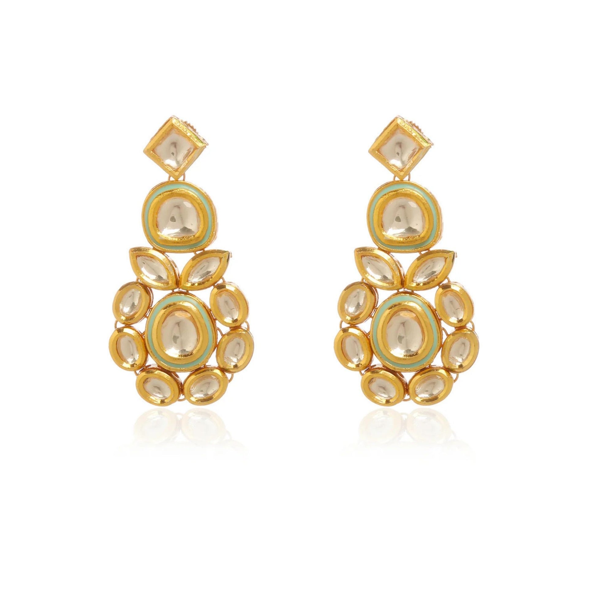 Gold earrings set with clear gemstones and a mint hue finish on a white background