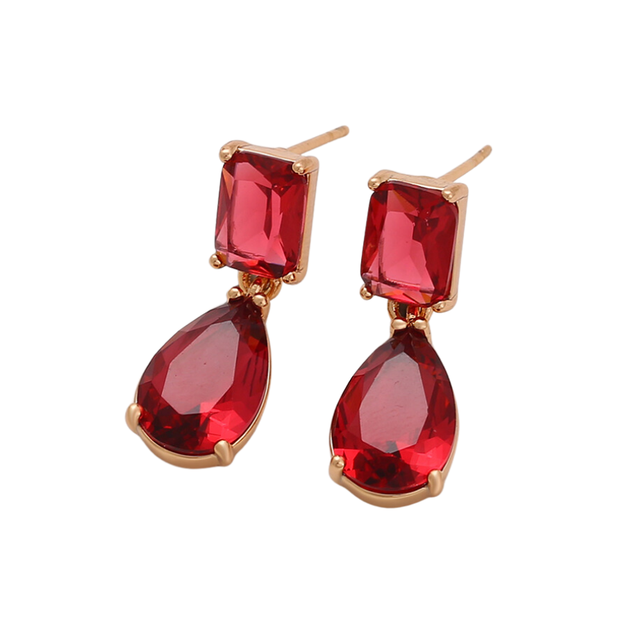 Pair of earrings with red zirconia stones on a white background