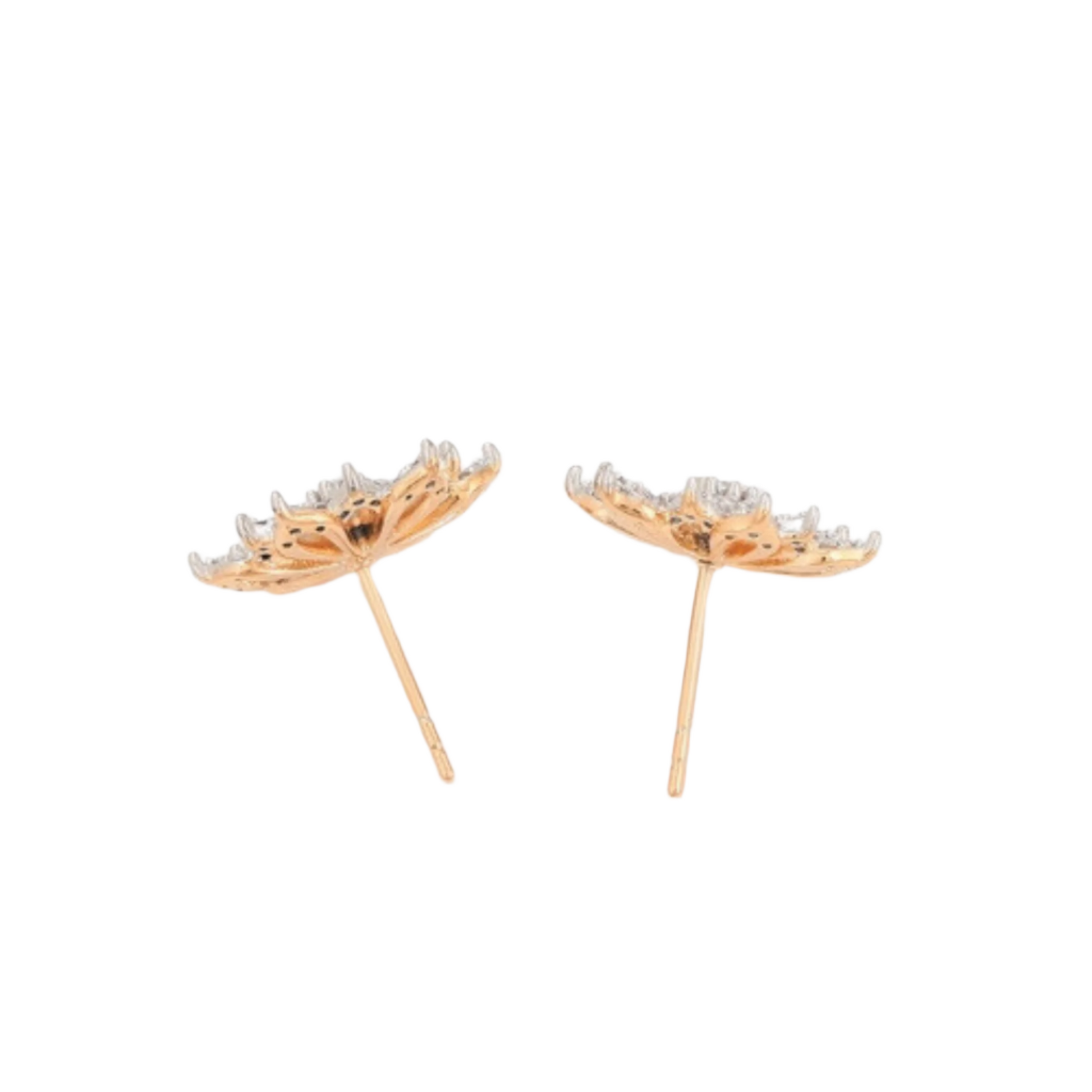 Pair of gold earrings with clear zirconia shaped as a snowflake on a white background