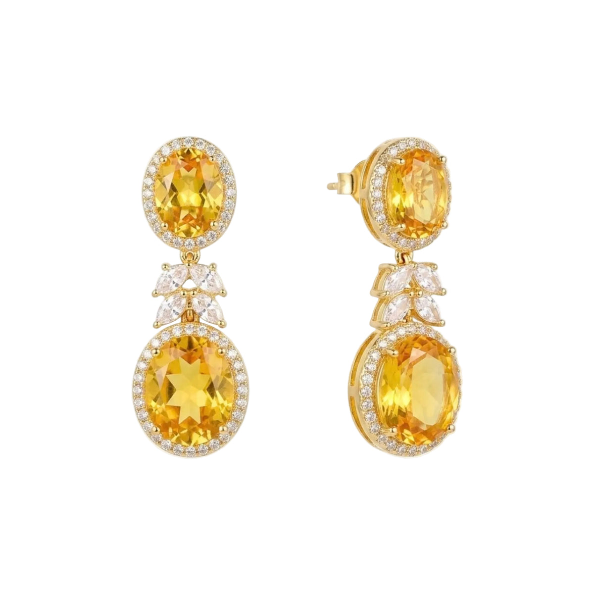 A pair of gold drop earrings featuring large oval yellow topaz gemstones surrounded by small clear pavé stones, with a smaller top oval stone and a larger round bottom stone on each earring from the Jewellery 4 Elegance collection, shown on a plain white background.
