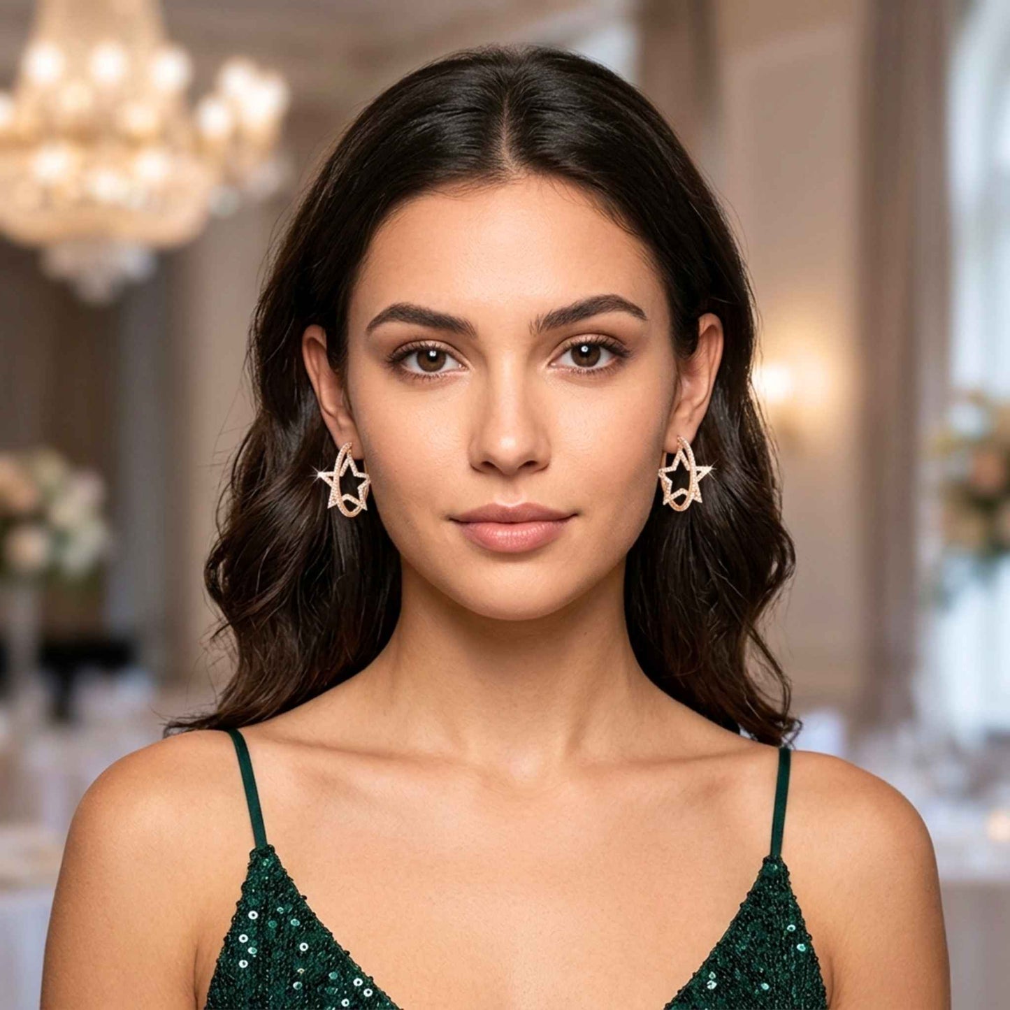 Woman wearing star-shaped hoop earrings from the Jewellery 4 Elegance collection set in an elegant indoor setting.  Digitally rendered model for scale