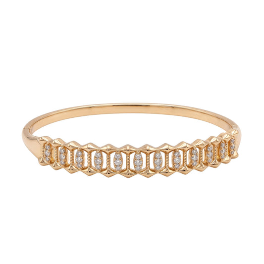 A rose gold bangle bracelet featuring a continuous row of baguette-cut clear gemstones in a textured channel setting, shown against a plain white background, from the Jewellery 4 Elegance collection..