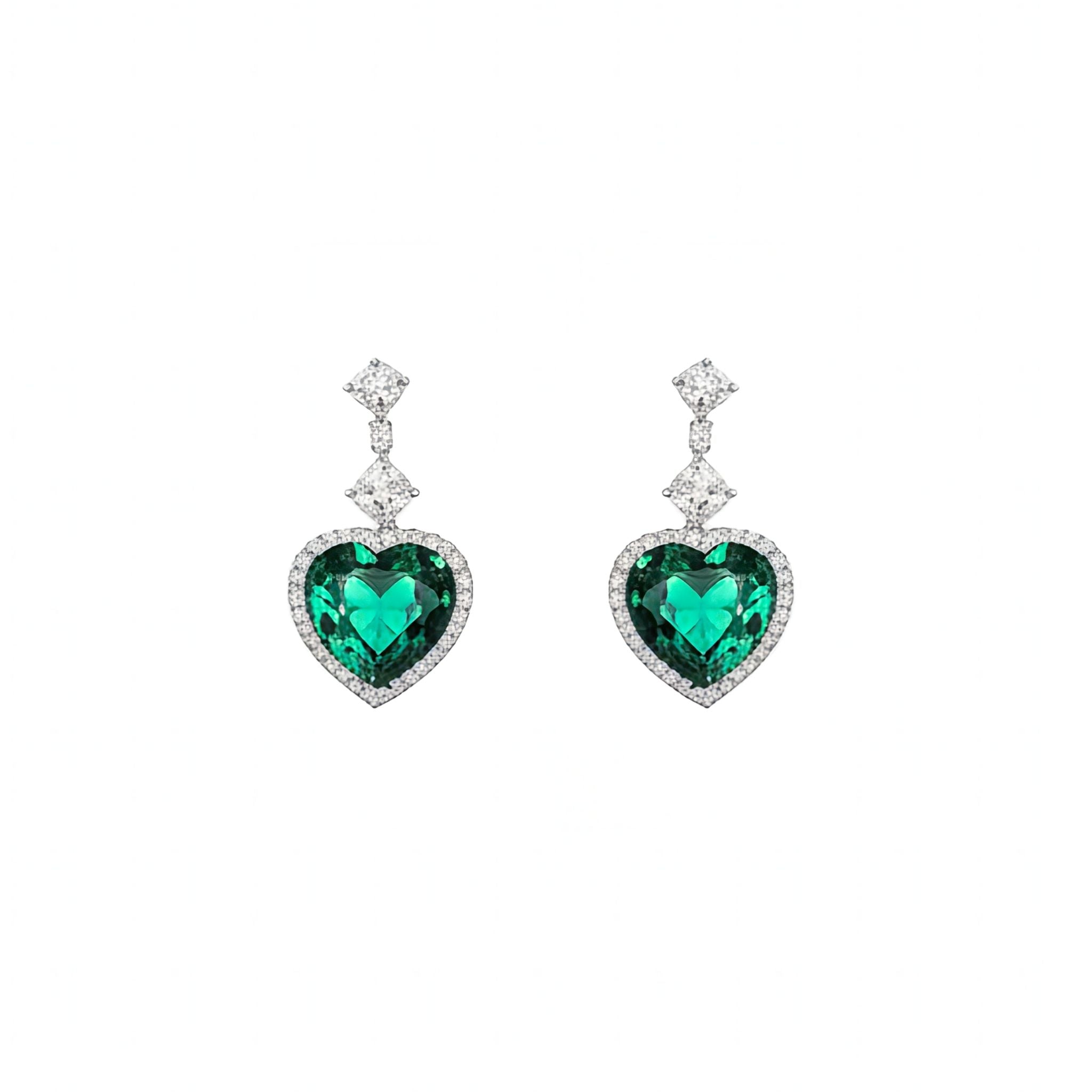 Matching pair of white gold plated drop earrings with geometric cubic zirconia links and emerald-green heart-shaped dangle pendants from the Jewellery 4 Elegance collections set against a white background.