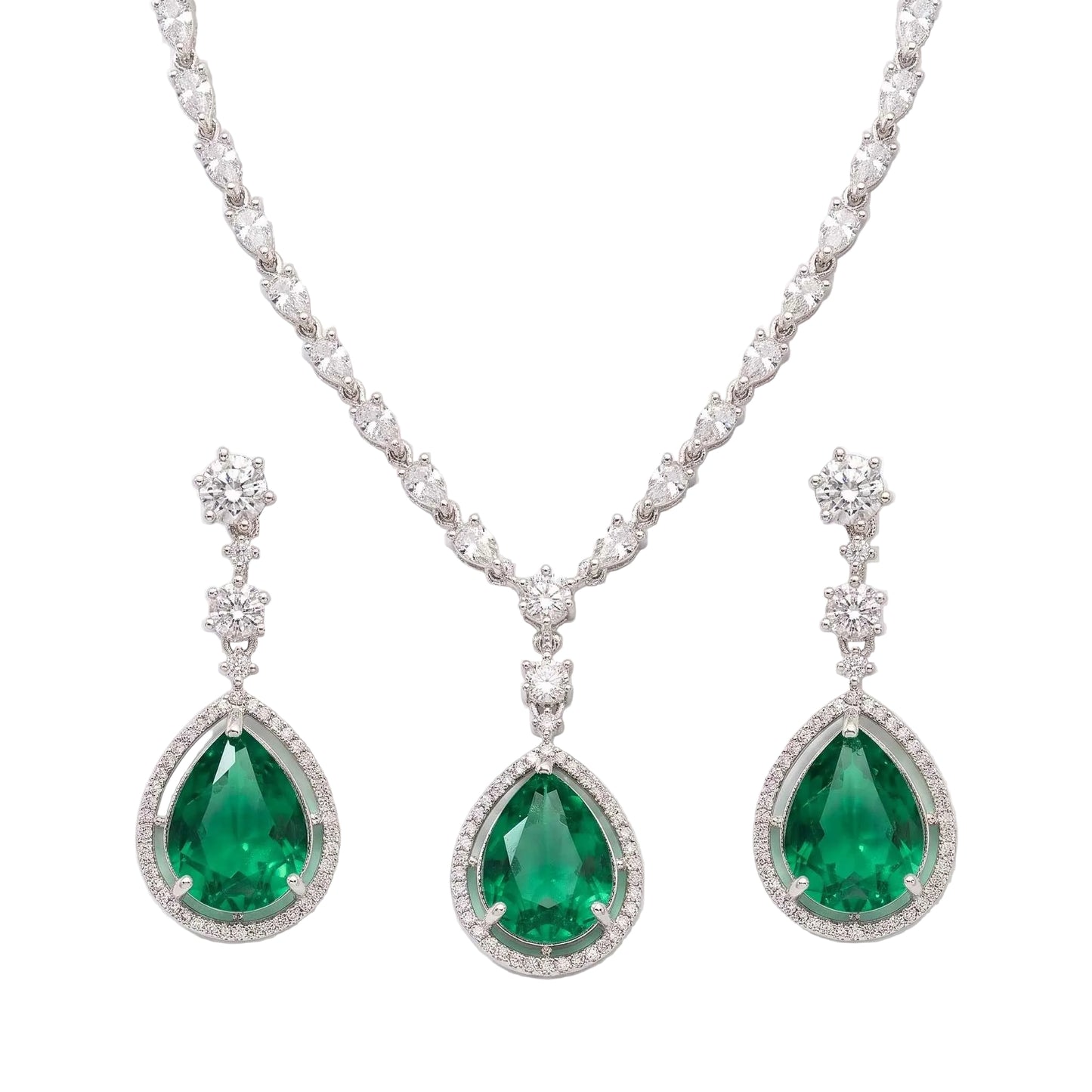 A luxury jewellery set featuring a silver-tone necklace and matching drop earrings with large pear-cut emerald green gemstones surrounded by clear pavé stones, set against a clean white background.  From the Jewellery 4 Elegance collection.