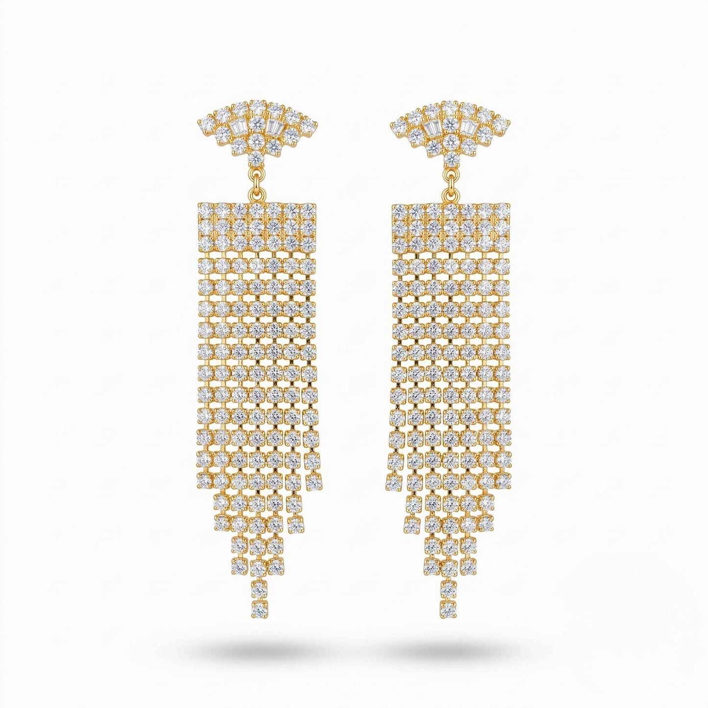 Pair of elegant gold plated dangle earrings featuring shimmering cubic zirconia gemstones in a multi-strand chandelier design set against a plain background.