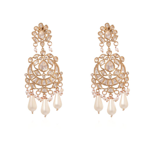 Pair of ornate gold plated Indian style Chandbali chandelier drop earrings featuring intricate cubic zirconia encrusting and dangling teardrop pearl beads from Jewellery 4 Elegance set against a white background.