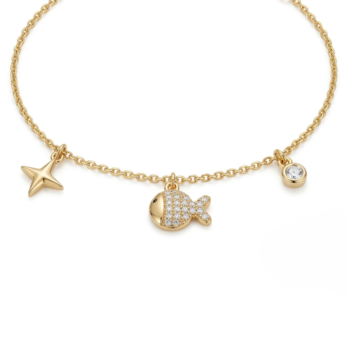A sweet and charming gold plated charm bracelet featuring a pave cubic zirconia fish charm, a polished star charm, and a bezel-set solitaire dangle from the Jewellery 4 Elegance collection.