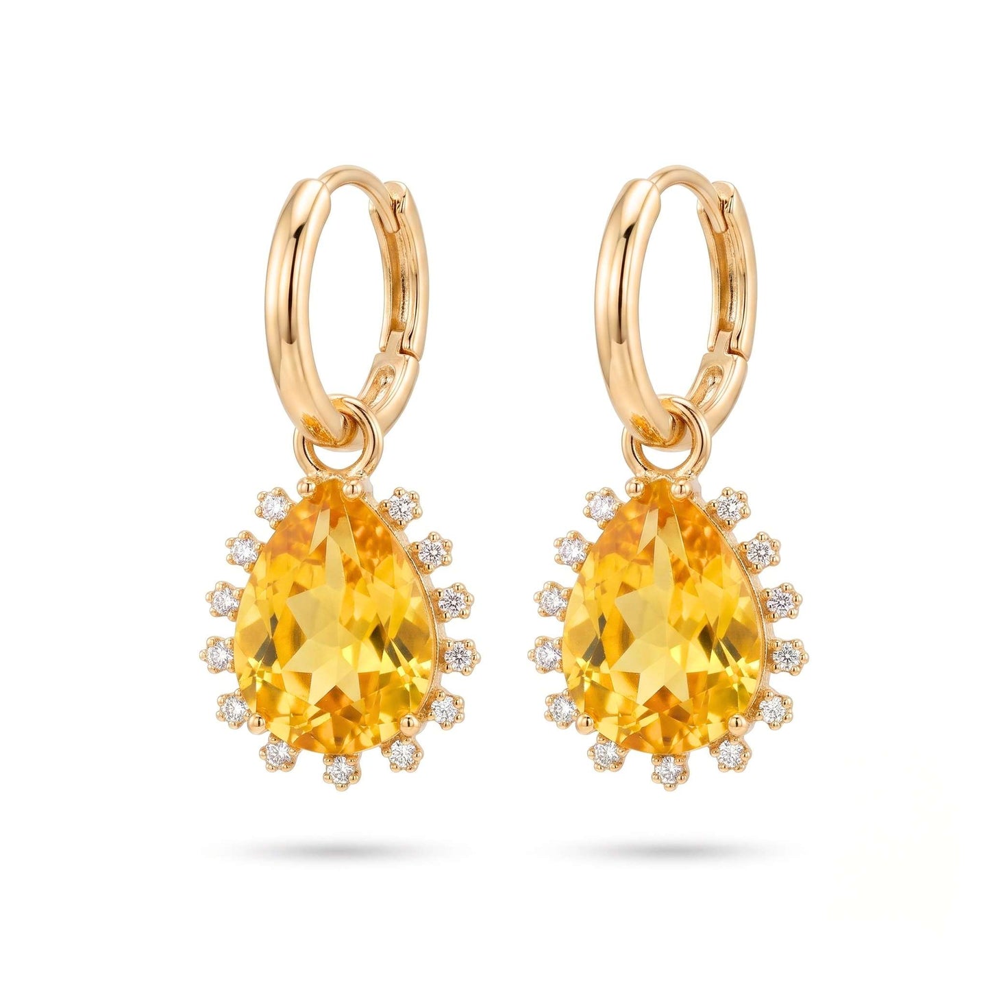 Gold plated hinged hoop drop earrings featuring pear-cut yellow stones surrounded by a delicate cubic zirconia halo on a polished gold finish.