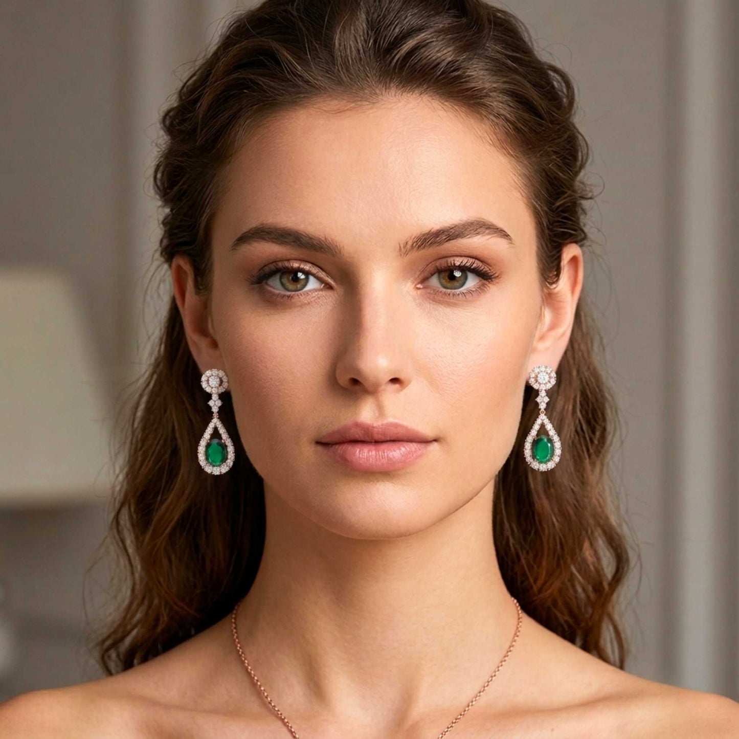 Elegant model wearing Rose Gold Emerald tear drop earrings with sparkling accents.  Digitally rendered model for scale