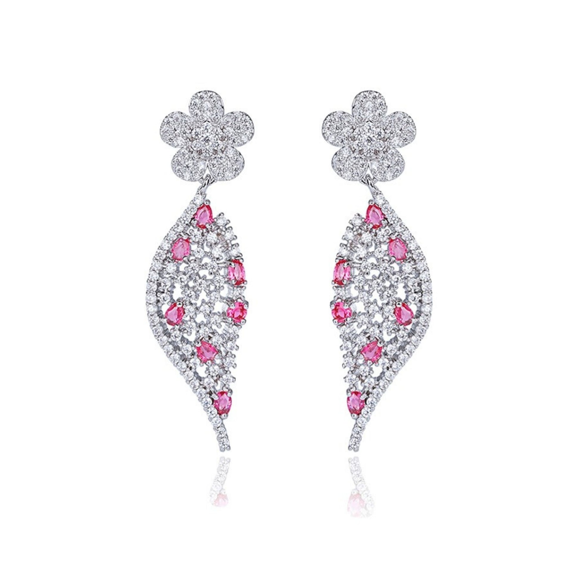 Elegant Jewellery 4 Elegance white gold plated drop earrings featuring a pave flower post and a curved leaf silhouette embedded with clear and vibrant red cubic zirconia gemstones set against a white background.