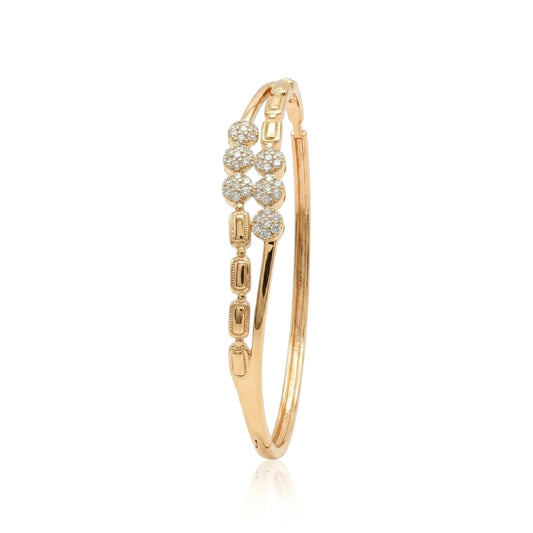 18k gold plated bangle bracelet featuring a dual-strand design with textured rectangular links and clusters of brilliant pave cubic zirconia, showcasing a seamless concealed closure on a white background.