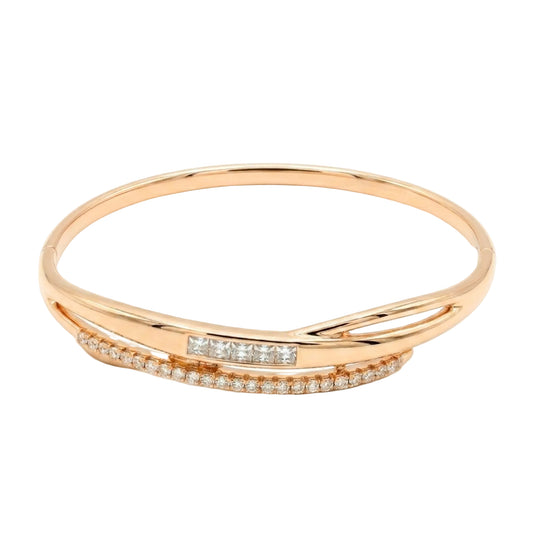 18k gold plated crossover bangle bracelet featuring channel-set princess-cut and pavé-set round cubic zirconia with a concealed snap closure on a white background