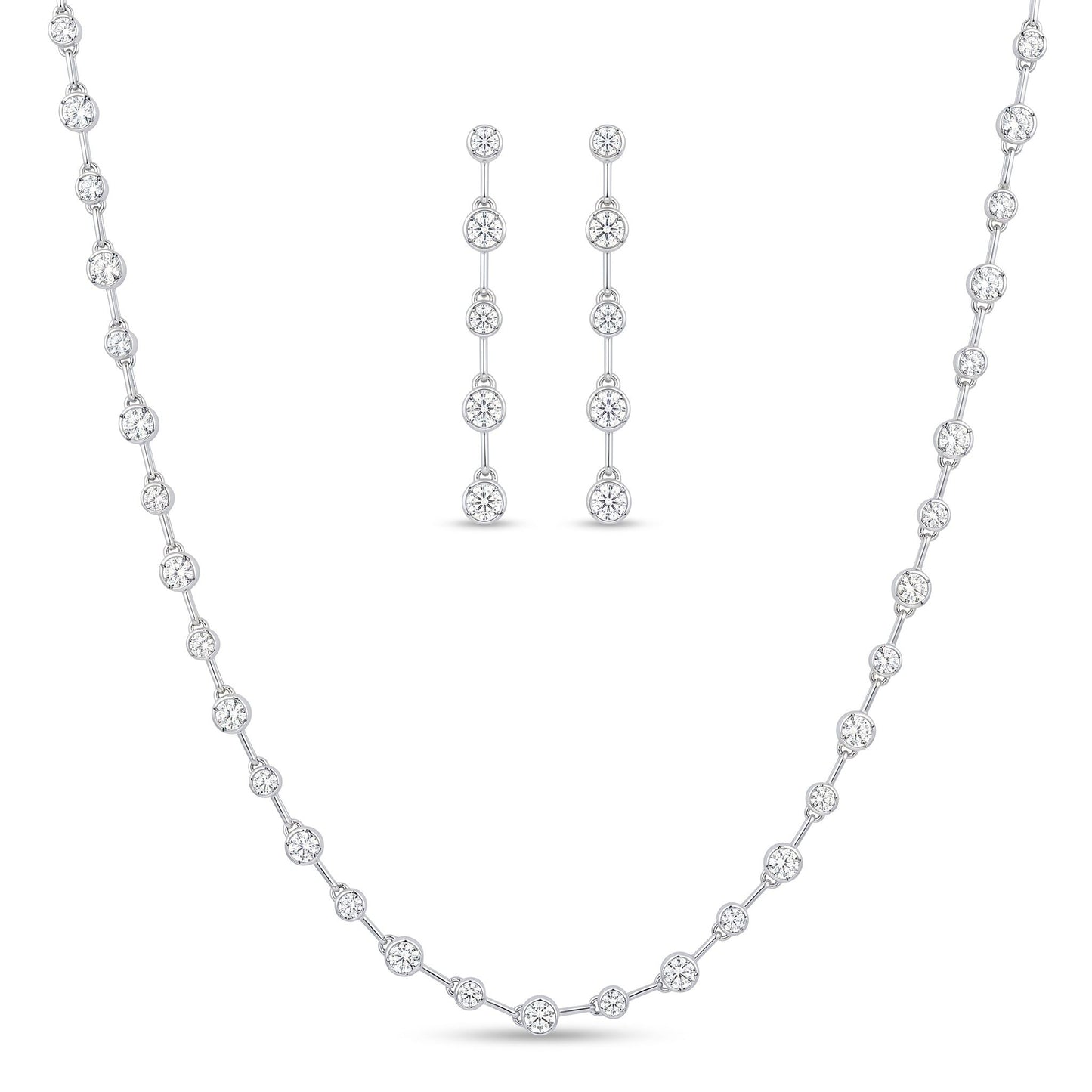 A white gold jewellery set featuring a delicate necklace and matching drop earrings, both adorned with clear round-cut stones, displayed on a clean white background.  From the jewellery f4 Elegance collection.